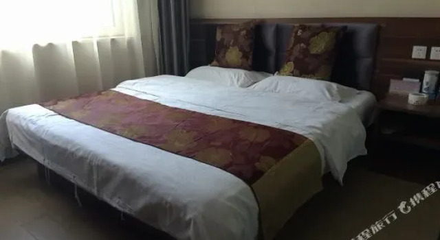 Millennium Inn, Varaa Hotelli Zhenlai Jilin