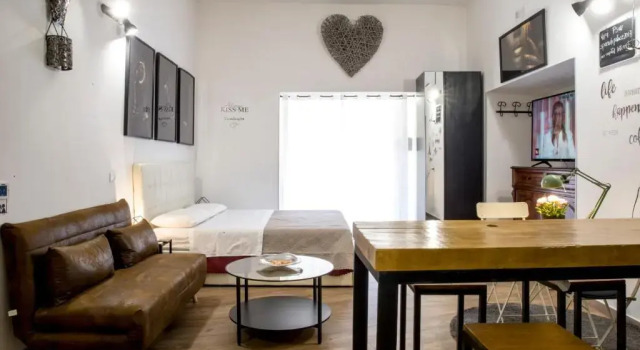 Четырёхместный номер Deluxe Napoli Centro Studios