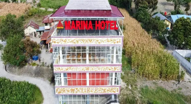 OYO 3215 Marina Hotel, Rezerwuj Hotel Sialanguan Pangururan