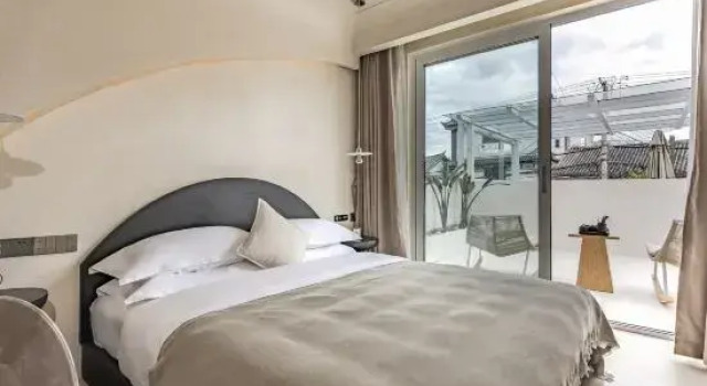 Люкс Jiujian Designer Homestay (Dali Net Red Swan Yanxi Branch)