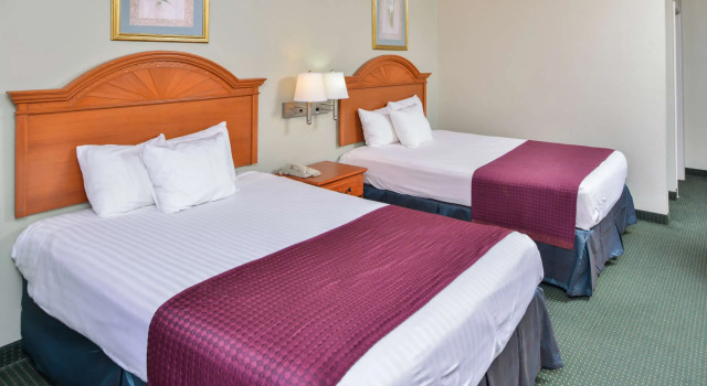 Четырёхместный номер Standard Americas Best Value Inn Wiggins