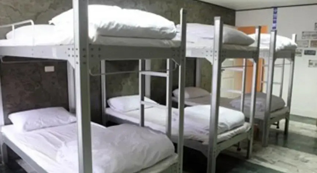 Кровать в общем номере Xie Tainan Castle Town B&B