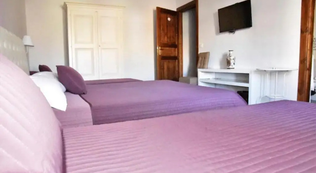 Четырёхместный номер Standard с балконом Simonettas Rooms