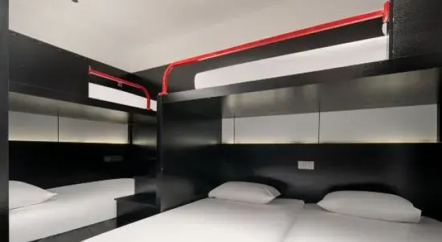 Кровать в общем номере Leishu E-Sports Hotel (Changsha Wuyi Square He Long Gymnasium)