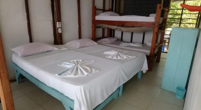 El Hamaquero Hostal EcoNativo, Забронировать Отель Исла-Гранде Rosario and San Bernardo Islands, рядом с Пляж острова Гранде