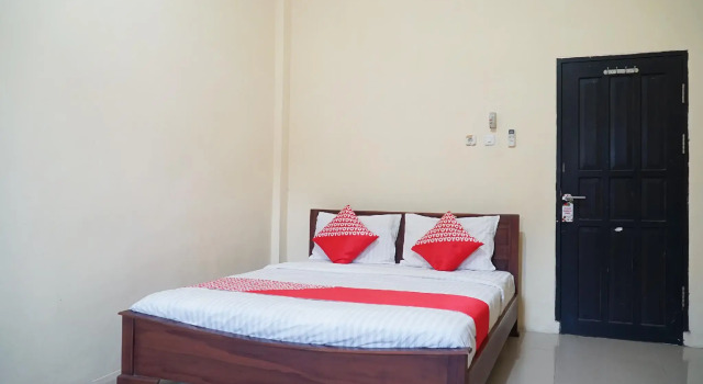 OYO Flagship 1034 Pondok Mulia Guest House Syariah, Rezervovat Penzión Hotely v Kalimantan s parkováním, Parkování