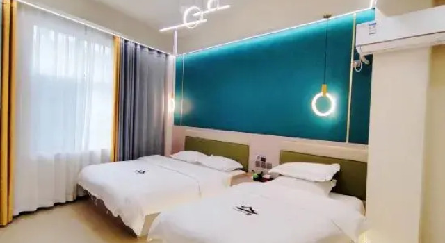 Семейный люкс Deluxe Maitreya Yixi Yixia Homestay