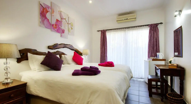 Четырёхместный семейный номер Standard с видом на сад Maputaland Guest House