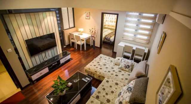 Апартаменты c 1 комнатой Zixinju Aparthotel
