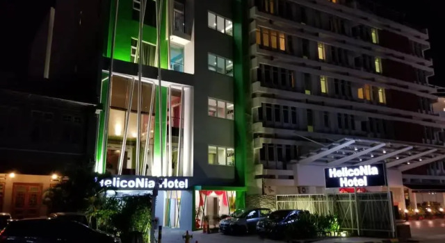 Postel ve společném pokoji Yan Hotel