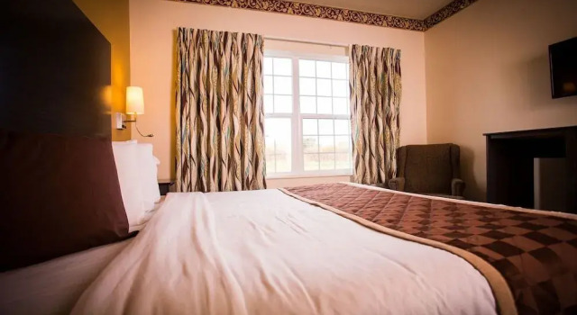 Chisholm Inn & Suites, Buchen Sie Hotel Chisholm USA