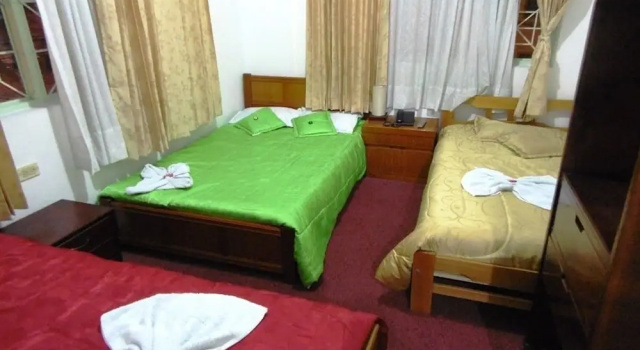 Кровать в общем номере Hotel Andino Real