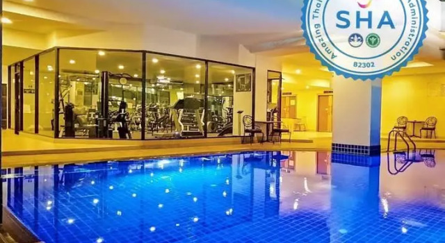 Кровать в общем номере Tai Pan Hotel