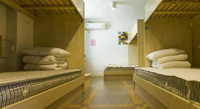 Кровать в общем номере Huangshan Kunlun International Youth Hostel