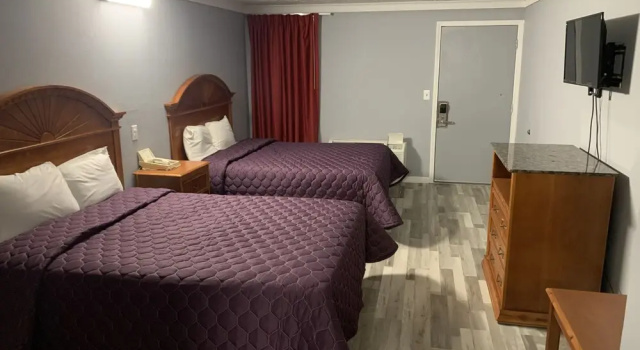 Четырёхместный номер Standard Executive Inn