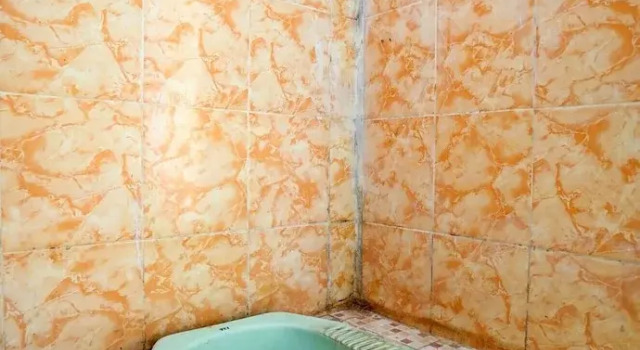 Номер Economy SPOT ON 92480 Iwn Homestay Syariah