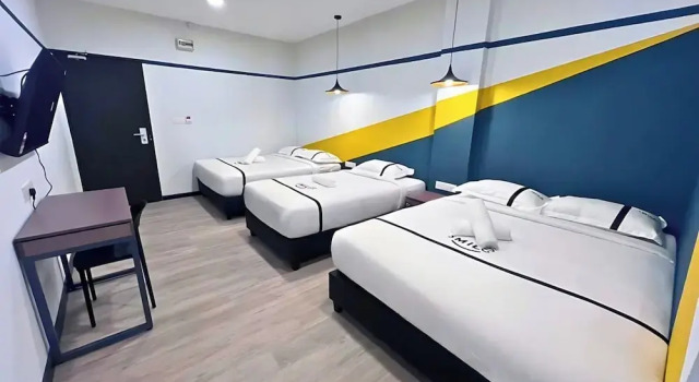 Четырёхместный семейный номер Standard Seeds Hotel Danau Kota PV12