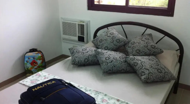 Rullan Apartelle, Забронировать Отель Анда Лусон