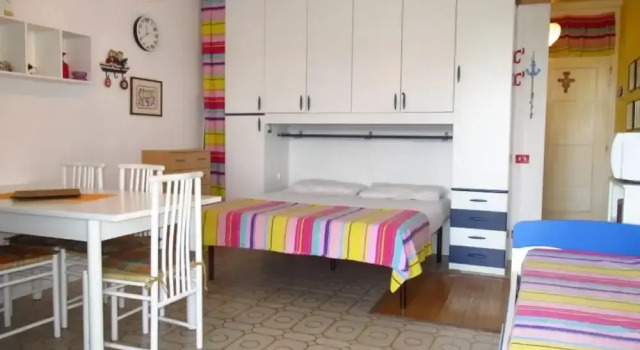 Colourful Studio With Shared Pool for 4 Guests, Забронировать Апартаменты/квартира Каорле Линьяно-Ривьера