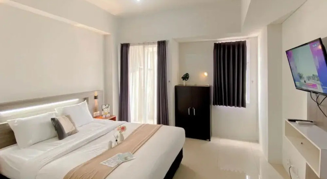Апартаменты Cozy Studio Apartment At Vittoria Residence