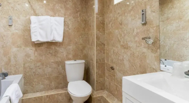 Четырёхместный номер Standard Stuart Hotel