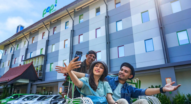 Кровать в общем номере POP! Hotel Sangaji Yogyakarta