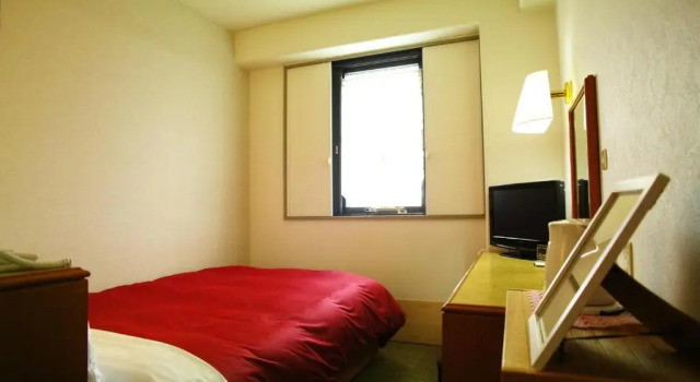 Кровать в общем номере (женский номер) Tourist Hotel Hitachi