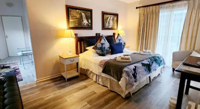 Luxo quarto Ash River Lodge B&B