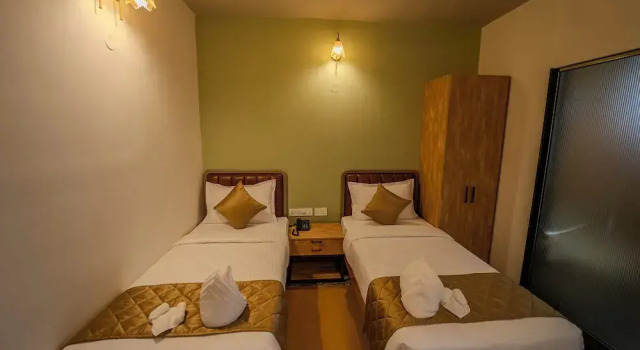 Номер Deluxe Atithyaa Hotel
