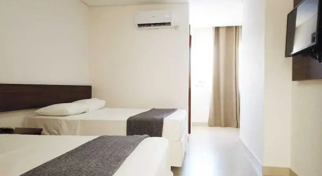 Четырёхместные апартаменты Monte Pascoal Praia Hotel