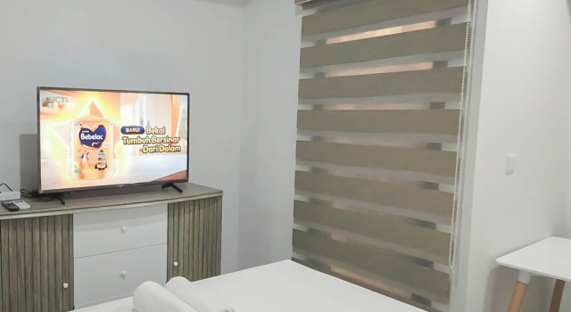 Студия Standard Basic Studio At Apartment Delft Ciputra Makassar