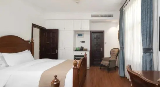 Семейный люкс с балконом и с видом на сад Gulangyu Chuncao Fragrance Seaview Villa (Sanqiutian Wharf Branch)