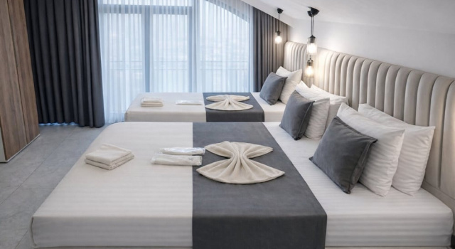 Трёхместный номер Deluxe D Twins plus Hotel