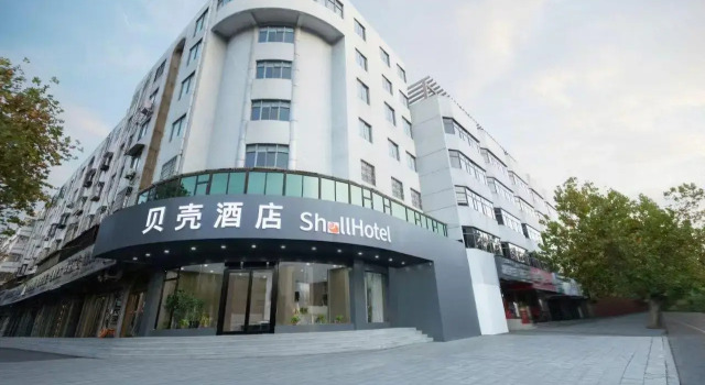 Shell Hotel Zhoukou Jiaotong Zhong Road Bus Center Station, Prenota Hotel Zhoukou Henan