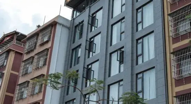 Jinghong Kuan Yee Tea Hotel, Buchen Sie Hotel Hotels in Yunnan mit Parkplatz, Parkplätze
