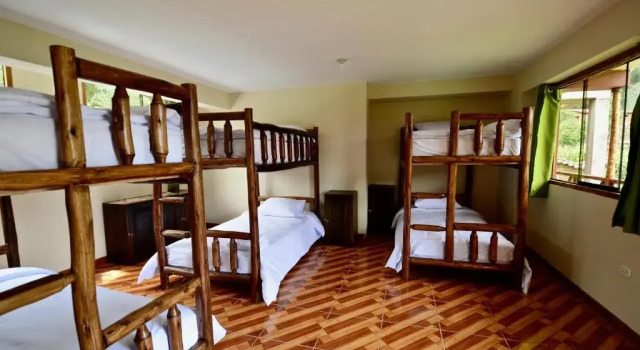 Кровать в общем номере Kinsapacha - Ecolodge & Yoga Centre