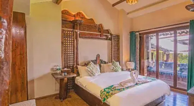 Lijiang Xianghe Yunduo Inn, Забронировать Отель Отели Лицзян с бассейном, рядом с Улица Сквер-стрит Древнего города Даянь, Бассейн