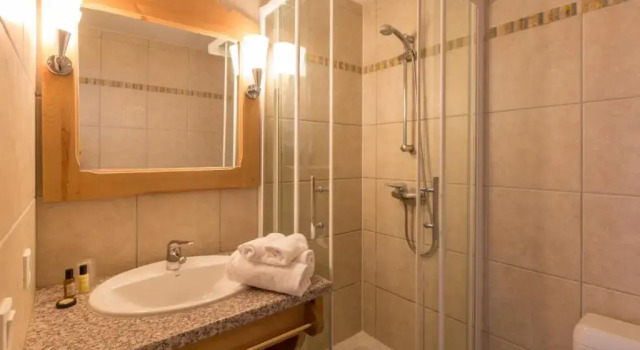 Кровать в общем номере с 6 комнатами Résidence Le Sun Valley