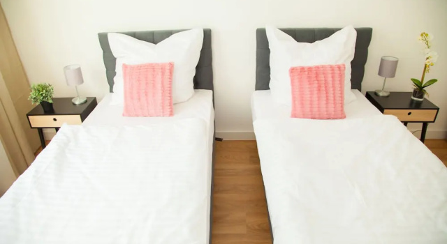 Кровать в общем номере с 6 комнатами Apartment Haus Heidelberg