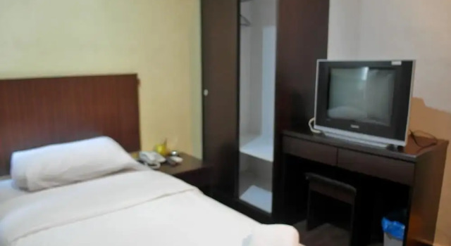 Номер Economy Li Garden Hotel