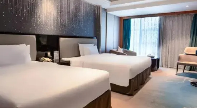 Семейный номер Deluxe Shishi Wanjia International Hotel