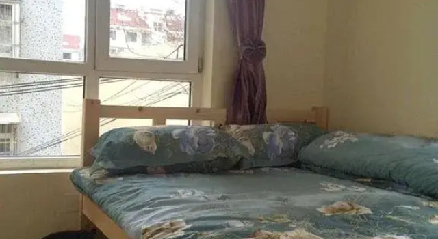 Qingdao Shuimu Holiday Hotel, Забронировать Отель Циндао 