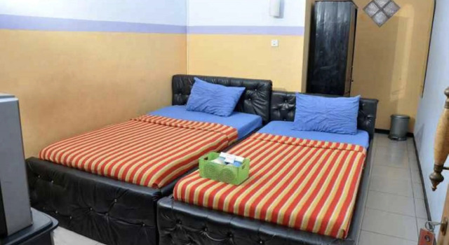 Standard chambre RedDoorz Syariah At Santana Stasiun Kepanjen