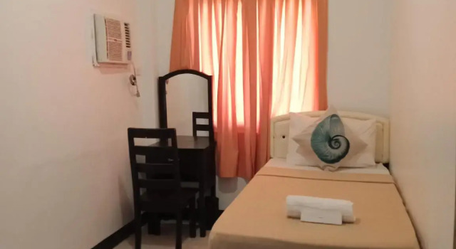 Standard quarto Amax Inn Cebu