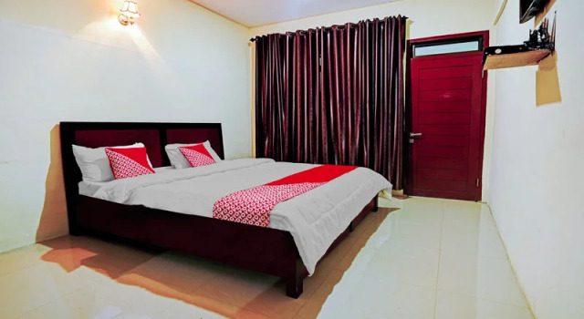 Двухместный люкс OYO 90331 Hotel Toba Shanda