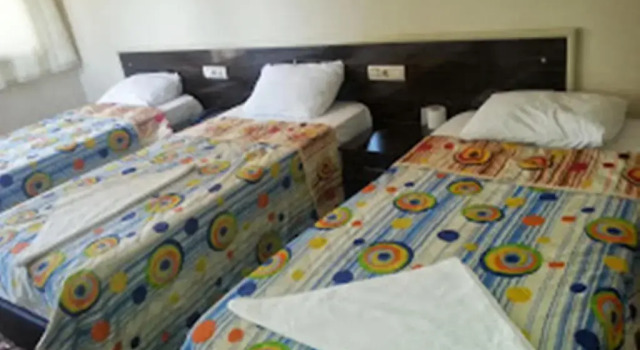 Кровать в общем номере Anatolia Hotel