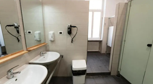 Кровать в общем номере Roma Scout Center