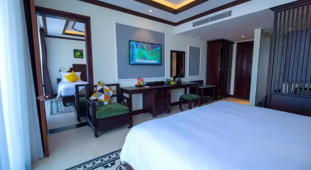 Номер Premier с балконом Grand Signature Resort Hoi An by M Village, a brand of Modern Village Lifestyle