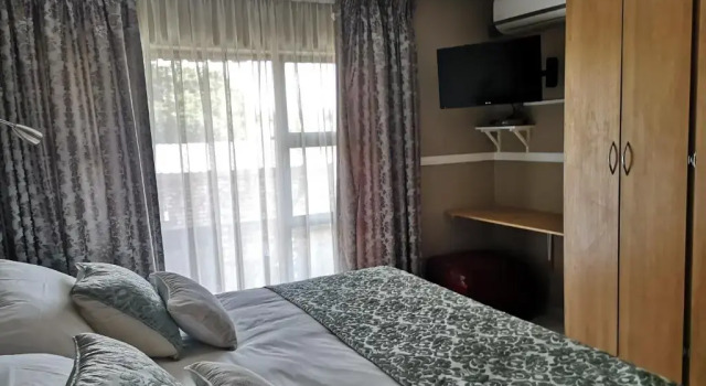 Трёхместный номер Standard с балконом Dormio Manor Guest Lodge