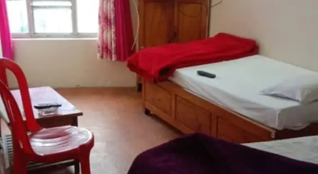 Luksusowy czteroosobowy pokój Goroomgo Siljong Gangtok